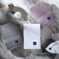 Bordado personalizado de marca de luxo toalhas de mão macia de algodão